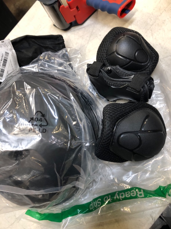 Photo 1 of Helmet and Knee Pads Size M