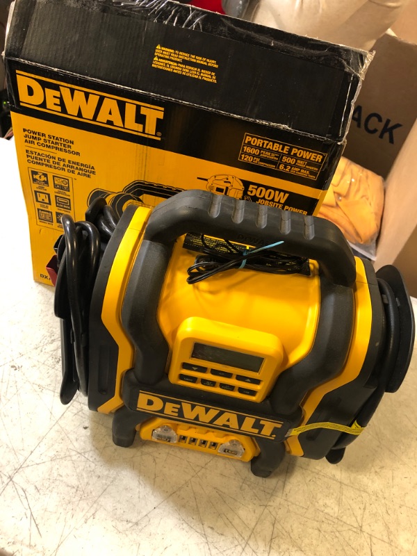 Photo 2 of DEWALT DXAEPS14 1600 Peak Battery Amp 12V Automotive Jump Starter/Power Station with 500 Watt AC Power Inverter, 120 PSI Digital Compressor, and USB Power , Yellow