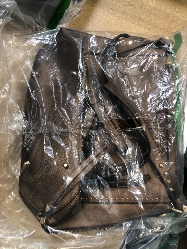 Photo 1 of Brown hand bag / purse 