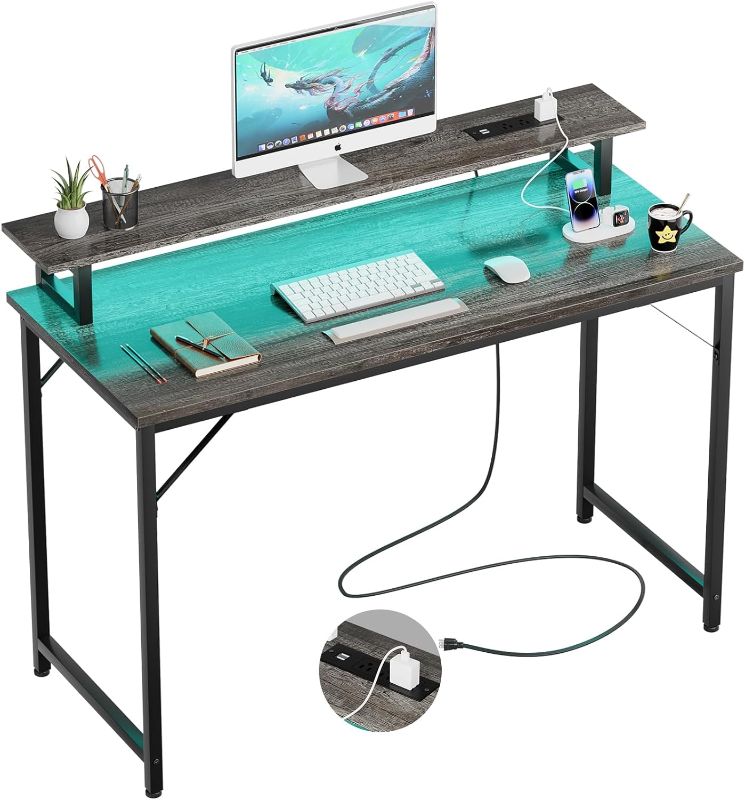 Photo 1 of 47 inch Computer Desk with Power Outlets, Gaming Desk with LED Lights, Home Office Work Desk with Monitor Shelf, Modern Office Desk Study Writing Table for Small Spaces, Black Oak
