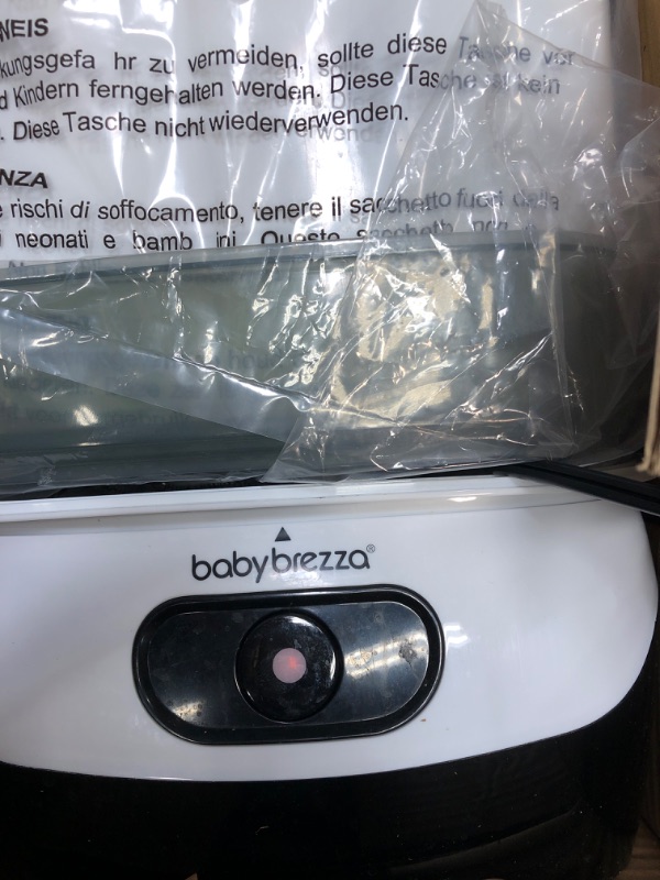 Photo 2 of Baby Brezza 4 in 1 Baby Bottle Sterilizer Machine – Largest Capacity Electric Steam Sterilization – Pacifiers, Breast Pump Parts + Universal Sterilizing for All Bottles: Plastic, Glass, Large, Small