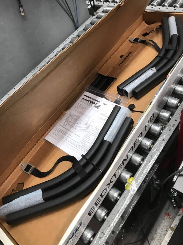 Photo 1 of Lund-in-Motion Universal Truck Bed Xtender by AMP Research