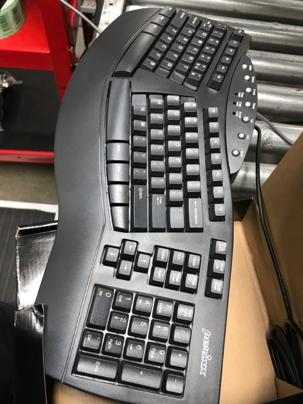 Photo 1 of Perixx Periboard-512 Ergonomic Split Keyboard - Natural Ergonomic Design - Black - Bulky Size 19.09"x9.29"x1.73", US English Layout Wired Black Keyboard
