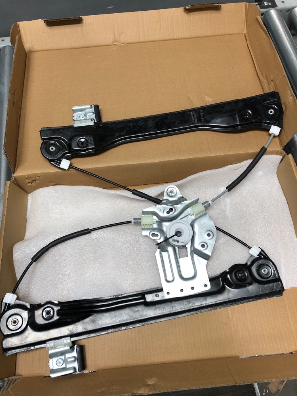 Photo 1 of 748-974 Front, Driver Side Power Window Regulator, with Motor - Sedan for Dorman