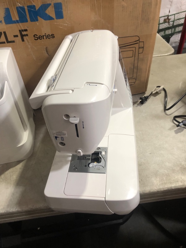 Photo 7 of ***USED - POWERS ON - UNABLE TO TEST FURTHER - LIKELY MISSING PARTS***
JUKI HZL-F300 Sewing and Quilting Machine , White