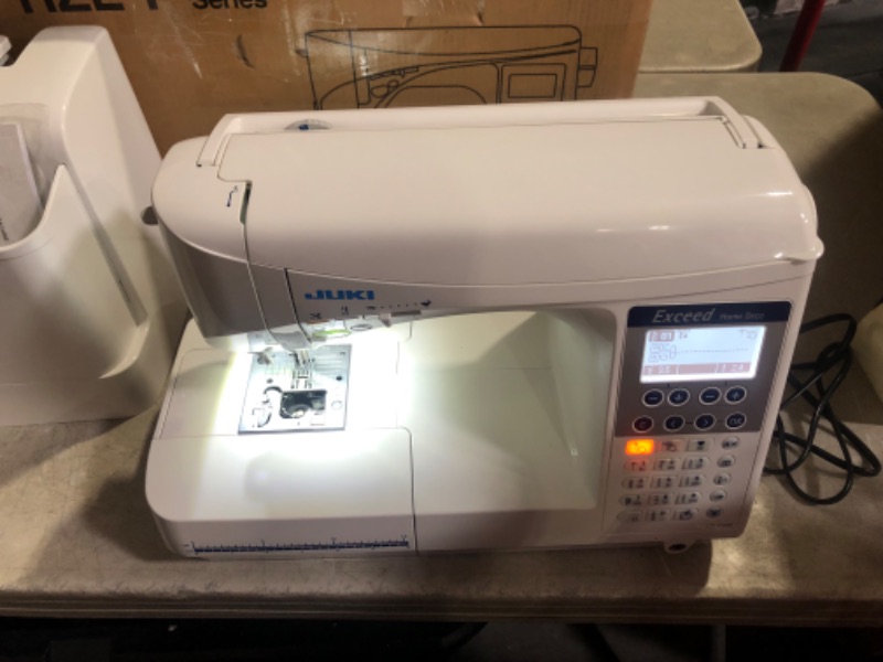 Photo 2 of ***USED - POWERS ON - UNABLE TO TEST FURTHER - LIKELY MISSING PARTS***
JUKI HZL-F300 Sewing and Quilting Machine , White