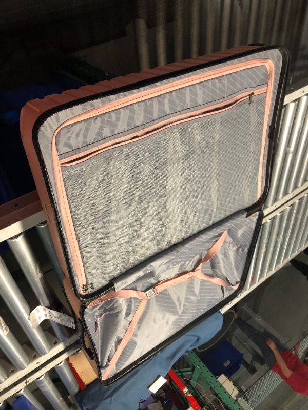 Photo 3 of ***DAMAGED - HAS A HOLE IN IT - CRACKED - SEE PICTURES - NO PACKAGING***
U.S. Traveler Boren Polycarbonate Hardside Rugged Travel Suitcase Luggage with 8 Spinner Wheels, Aluminum Handle, Pink, Checked-Large 30-Inch Checked-Large 30-Inch Pink