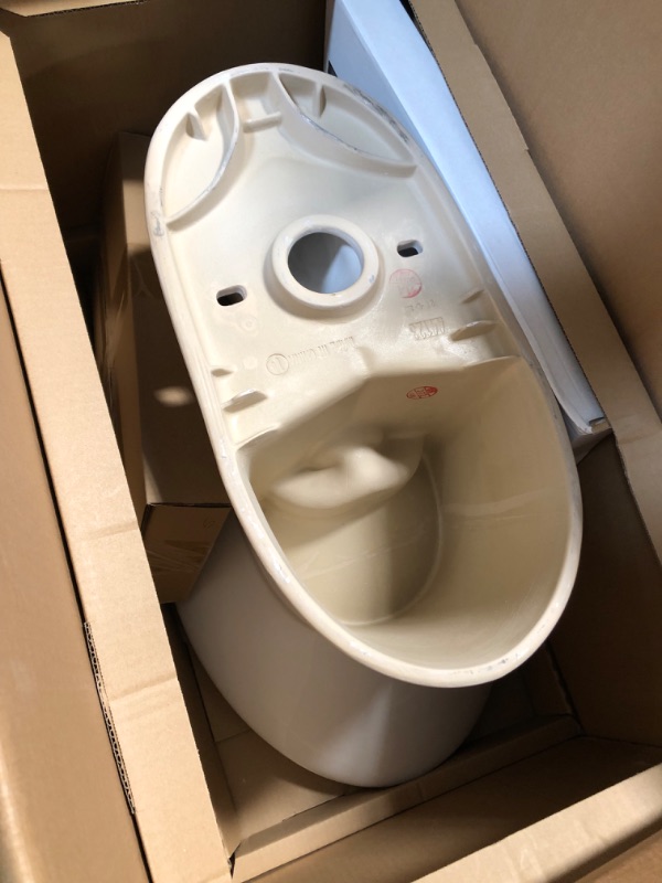 Photo 1 of 2-piece 1.1 GPF/1.6 GPF High Efficiency Dual Flush Complete Elongated Toilet in White, Seat Included