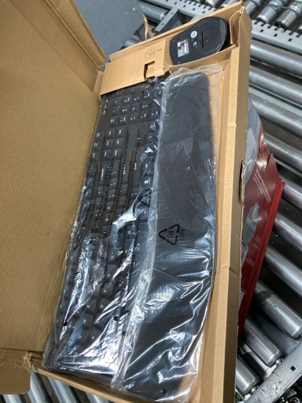 Photo 1 of Amazon Basics Ergonomic Wireless Keyboard - QWERTY - Black (mouse not included)
