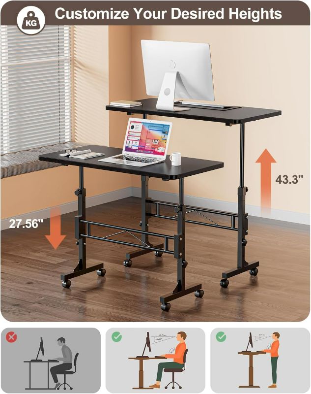 Photo 4 of (NON-REFUNDABLE) Small Standing Desk Adjustable Height, Mobile Stand Up Desk with Wheels, 32 Inch Portable Rolling Desk Small Computer Desk, Portable Laptop Desk Standing Table Black