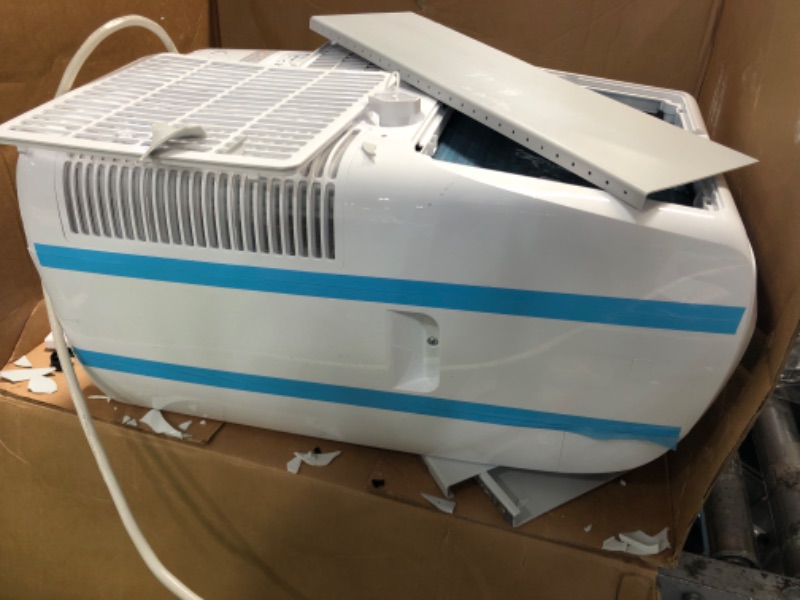 Photo 1 of *SEE NOTES* HEAVY DAMAGE TO UNIT ** BLACK+DECKER Air Conditioner, 14,000 BTU Air Conditioner Portable for Room up to 700 Sq. Ft., 3-in-1 AC Unit, Dehumidifier, & Fan, Portable AC with Installation Kit & Remote Control White 14,000 BTU