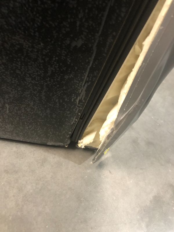 Photo 7 of ***MAJOR DAMAGE - SEE COMMENTS - NO PACKAGING***
Magic Chef 4.4 Cu. Ft. Mini Fridge in Stainless Steel Look Without Freezer