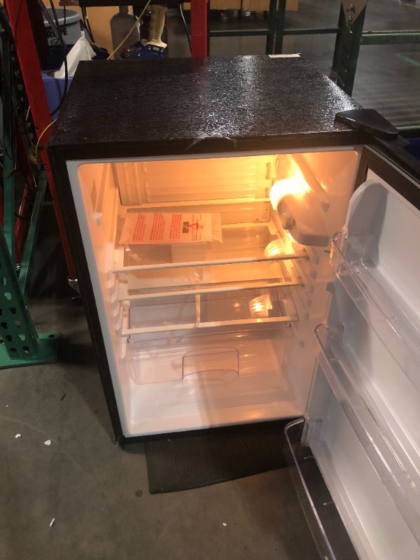 Photo 1 of ***MAJOR DAMAGE - SEE COMMENTS - NO PACKAGING***
Magic Chef 4.4 Cu. Ft. Mini Fridge in Stainless Steel Look Without Freezer