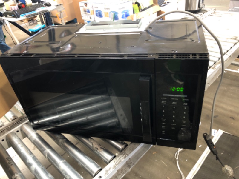 Photo 2 of 1.7 cu. ft. 1000-Watt Over the Range Microwave in Black