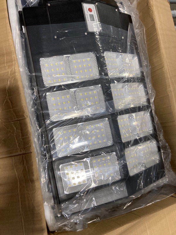 Photo 1 of 2 Pack 1000W Solar Street Lights Outdoor,6500K 100000LM Commercial Parking Lot Light Dusk to Dawn,Solar Security Flood Lights with Motion Sensor for Street, Garden 1000W-2PACK
