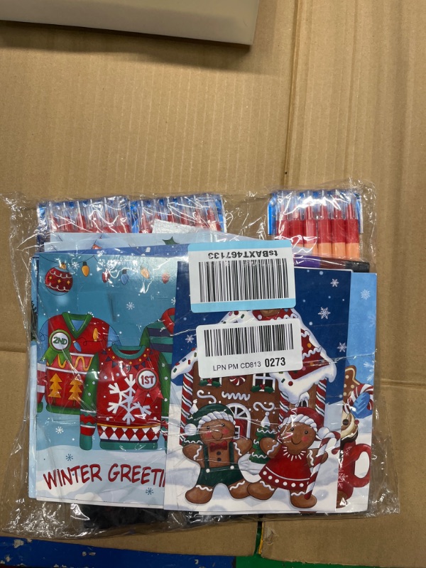 Photo 1 of 36 Pcs Christmas Coloring Book with Crayons Kids Xmas Drawing Books Christmas Theme Mini Coloring Book Snowman Gingerbread Sweater Activity Books for Xmas Holiday Party Goodie Bag Gift Stuffer
