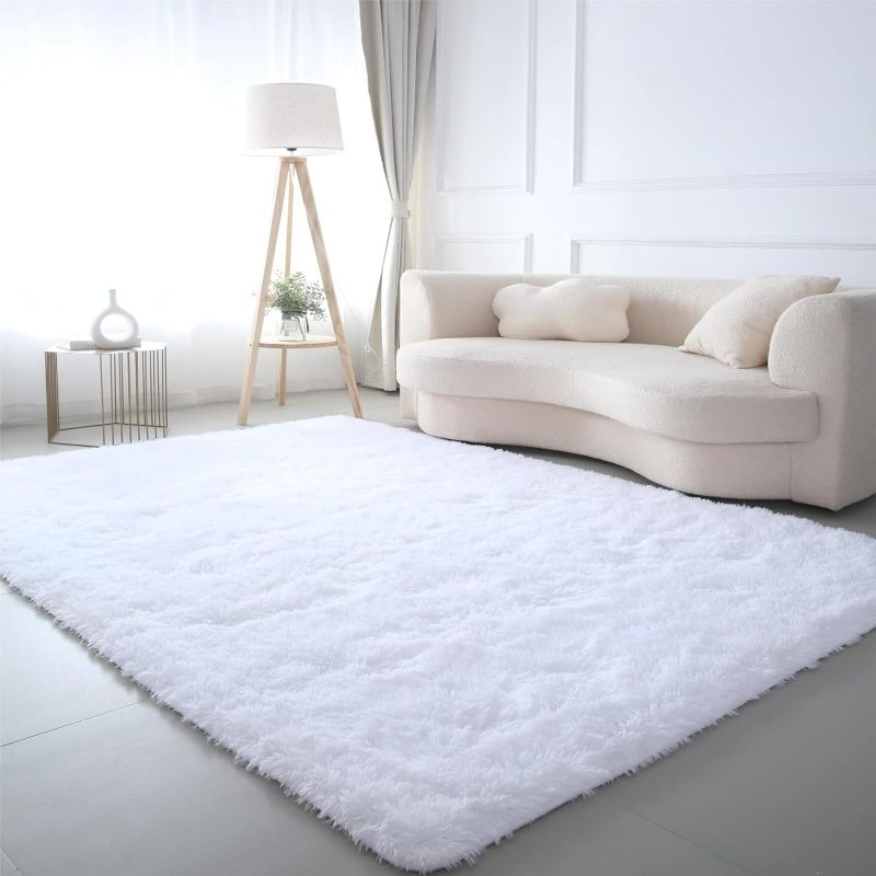 Photo 1 of **DAMAGED*** CAIYUECS Ultra Soft Shag Area Rug for Indoor, Kids Bedroom Living Room, Non-Skid Modern Nursery Faux Fur Fluffy Plush Rugs for Home Decor (5x7 Feet, White)

