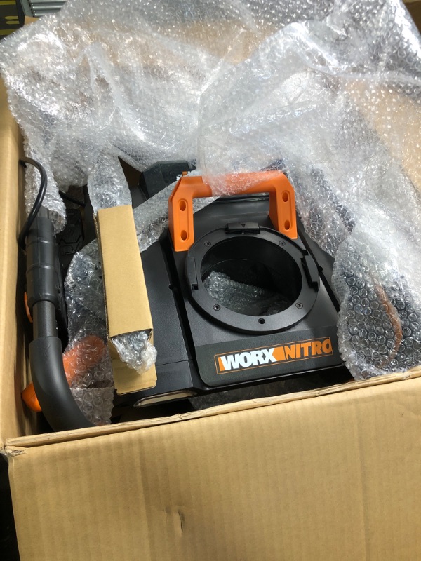 Photo 2 of **BOTTOM CRACKED AND BROKEN FOR PARTS***Worx 40V 20" Cordless Snow Blower Power Share with Brushless Motor - WG471 (Batteries & Charger Included) and Dupont Teflon Snow and Ice Repellant, 10-Ounce