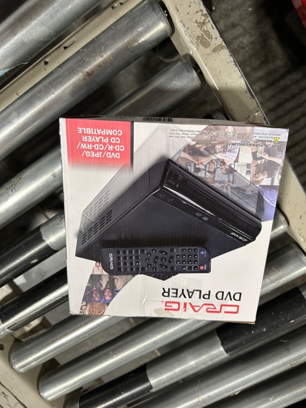 Photo 1 of Craig CVD512a Compact DVD Player with Remote in Black | Compatible with DVD/DVD-R/DVD-RW/JPEG/CD-R/CD-RW/CD | Progressive Scan | Multilingual Supported | AV Cable Connection