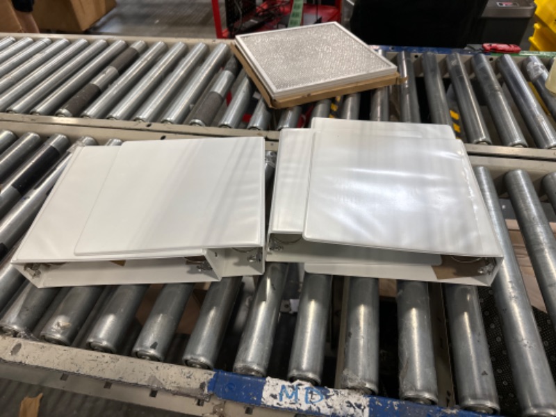 Photo 1 of set of 4 white binders 