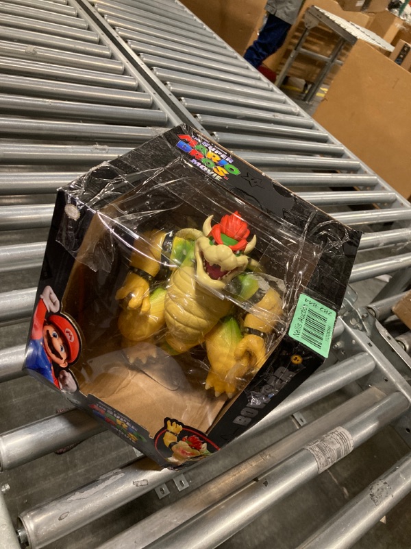 Photo 1 of The Super Mario Bros. Movie 7-Inch Feature Bowser Action Figure with Fire Breathing Effects