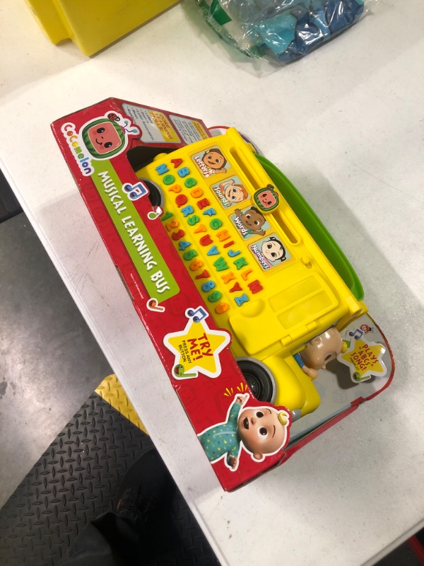 Photo 1 of CoComelon Musical Learning Bus, Number and Letter Recognition, Phonetics, Yellow School Bus Toy Plays ABCs and Wheels on the Bus, by Just Play