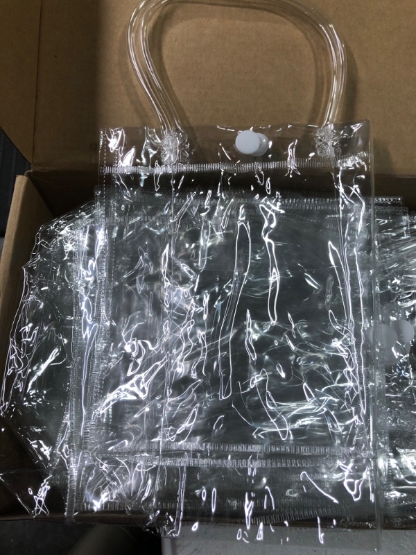 Photo 1 of BESARME 30 Pack Clear Gift Bags with Handle, Reusable Plastic Small Gift Wrap Tote Candy Bags for Christmas Party Favors Wedding Birthday (6.3" x 5.9" x 2.8")