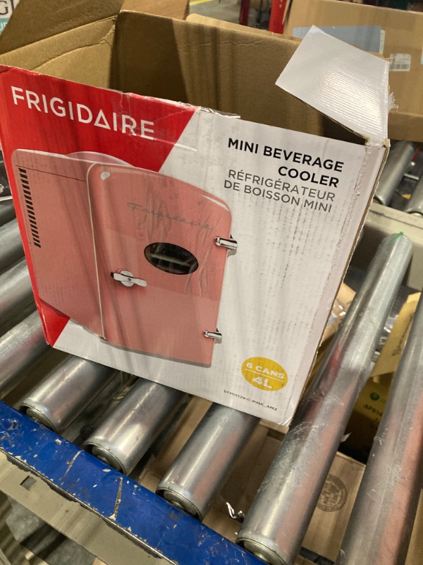 Photo 3 of *** NOT FUNCTIONAL**** SELLING AS PARTS***
Frigidaire Pink EFMIS129- AMZ EFMIS129 Mini Portable Fridge, 4 litres Capacity Chills Six 12oz Cans, 100% Freon-Free & Eco Friendly, Beverage Cooler Pink Cooler