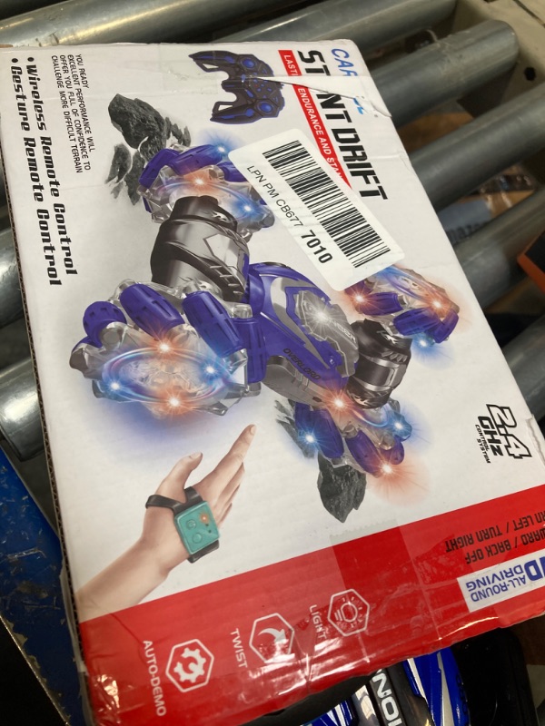Photo 1 of Gesture Sensing 4WD RC Stunt Car - Rotating, 2.4Ghz Remote Controlled Twister Car Toy Gift for Kids Age 8+ Blue