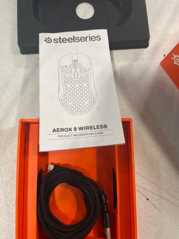 Photo 3 of SteelSeries Aerox 9 Wireless - Holey RGB Gaming Mouse - Ultra-lightweight Water Resistant Design - 18 Buttons – Bluetooth/2.4 GHz - 18K DPI TrueMove Air Optical Sensor