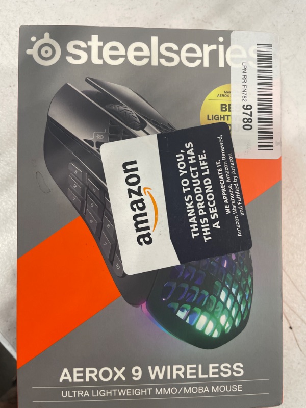 Photo 4 of SteelSeries Aerox 9 Wireless - Holey RGB Gaming Mouse - Ultra-lightweight Water Resistant Design - 18 Buttons – Bluetooth/2.4 GHz - 18K DPI TrueMove Air Optical Sensor