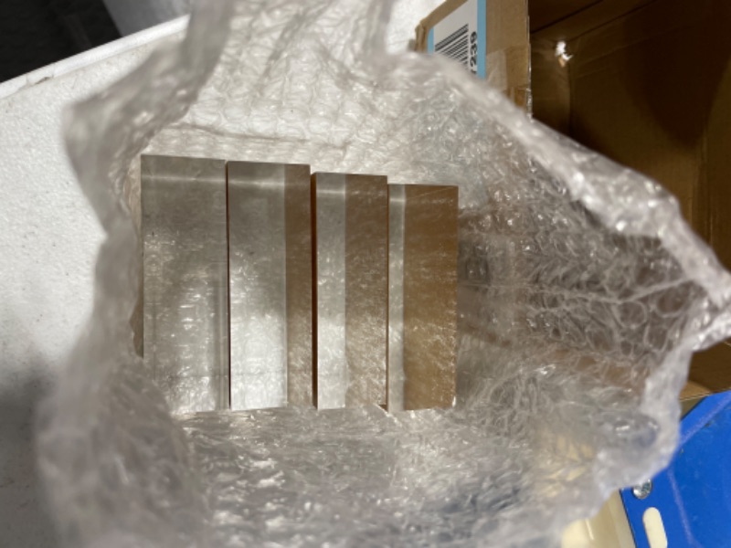 Photo 1 of Remerry 4 Pieces 3 x 3 x 1 Inch Acrylic Square Display Block Clear Polished Acrylic Cube Acrylic Jewelry Display Stand Ring Showcase Display Holder Base