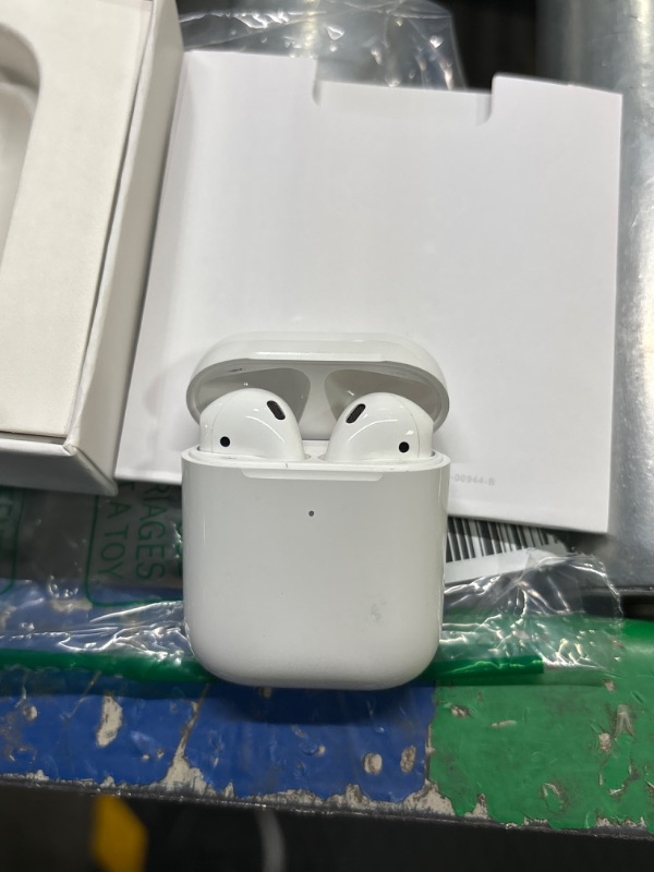 Photo 3 of Apple AirPods with Charging Case (Latest Model)