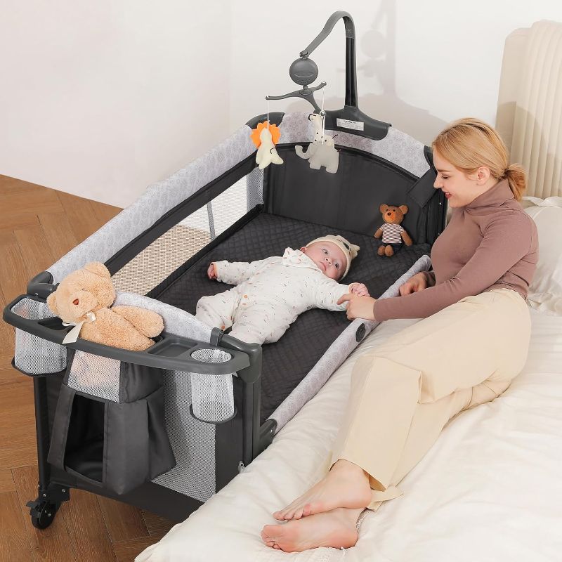 Photo 1 of ELEMARA 4 in 1 Wide Baby Bassinet Bedside with Diaper Changer,Long Next to Bed Crib with Mattress,Sheet,Music and Blackout Cover,Playpen Travel Bed with Storage,XL Co Sleeper with 3 Adjustable Height