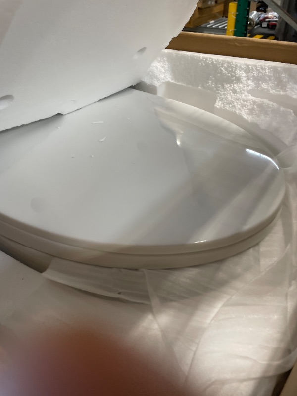 Photo 3 of ***FOR PARTS*** Swiss Madison Well Made Forever SM-1T254 St. Tropez One Piece Toilet, 26.6 x 15 x 31 inches, Glossy White Glossy White Top Flush