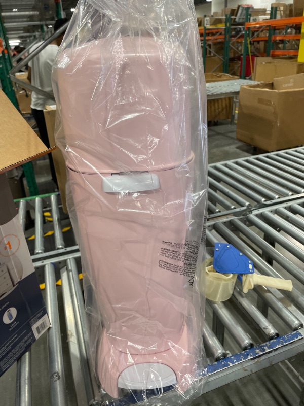 Photo 1 of Diaper Genie Complete Diaper Pail (Pink) with Antimicrobial Odor Control | Includes 1 Diaper Trash Can, 1 Refill Bags, 1 Carbon Filter Pink Pail + 1 Refill
