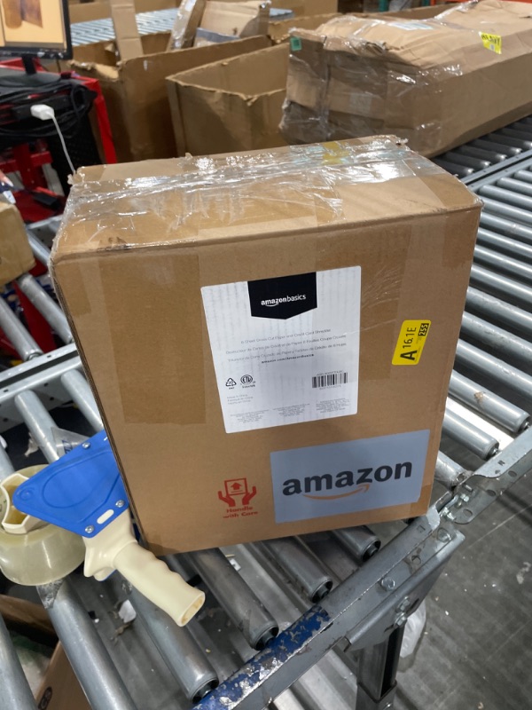 Photo 1 of Amazon Basics 8-Sheet Cross Cut Paper Shredder and Credit Card Shredder with 4.1 Gallon Bin 8 Sheet Shredder