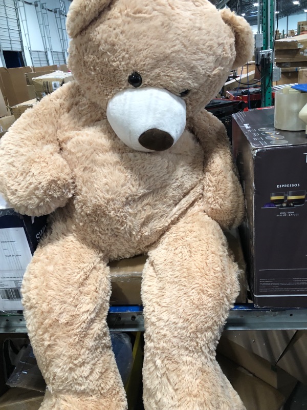 Photo 1 of DOLDOA Big Teddy Bear Stuffed Animals with Footprints Plush Toy for Girlfriend 51 inch (Brown)