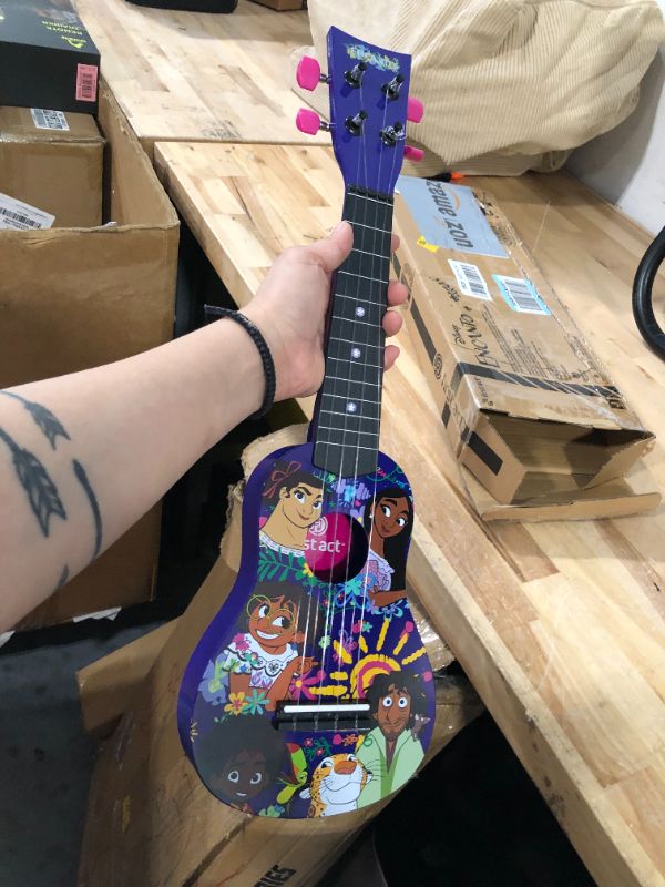 Photo 3 of First Act Discovery Encanto Ukulele - 20-Inch Soprano Uke - Ukulele for Beginners - Musical Instruments for Toddlers and Preschoolers - Ready to Play - Make Learning to Play Music Easy and Fun