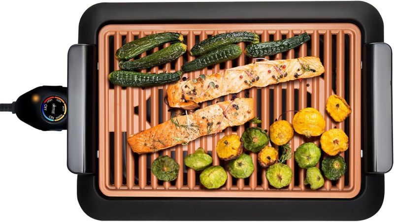 Photo 1 of ***NON FUNCTIONAL//SOLD AS PARTS*** 
Gotham Steel Smokeless Indoor Grill, Nonstick Indoor Smokeless Grill with Ceramic Coating & Adjustable Heating, Indoor Grill Electric Smokeless with Removable Grill/Griddle Plate, Healthy & Toxin Free 2023 Model