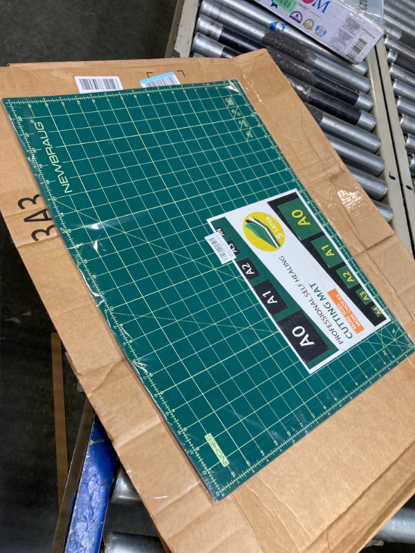 Photo 1 of NEWBRAUG 18'' × 24'' Perfect Self Healing Cutting Mat, Non-Slip Gridded Rotary Cutting Board, Necessary for Quilting, Sewing, Craft, Fabric & Scrapbooking(Green/Black) A2:18x24 inches