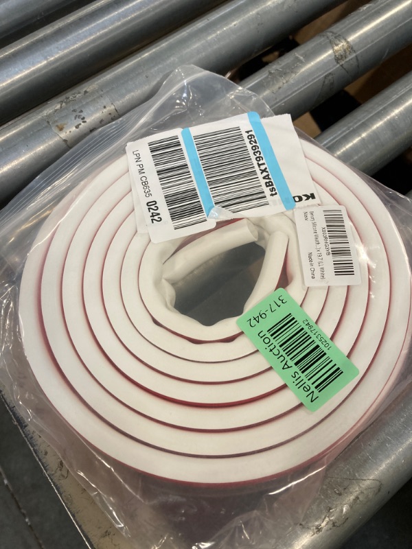 Photo 2 of [2023 Upgrade] 19.7Ft Silicone Door Weather Stripping Door Seal Strip for Doors & Windows, Multi-Layer Soundproof Chamber Design, Self-Adhesive, Seal 5/16 “- 15/32 "Large Gaps, Easy to Cut & Install 9/16" (W) x 15/32" (T) x 19.7' (L) White