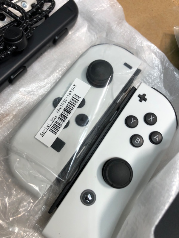 Photo 3 of **unable to test** needs to be charged**
Nintendo Switch – OLED Model w/ White Joy-Con White Console