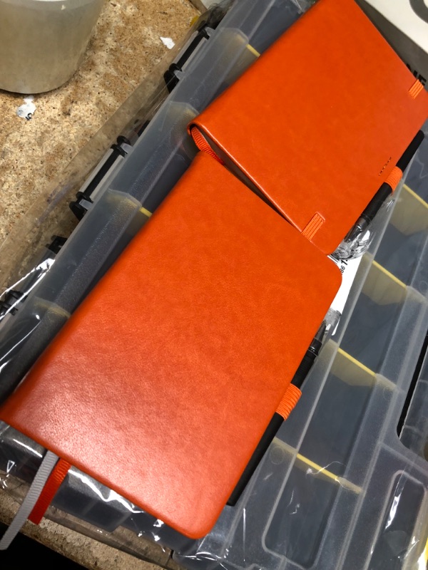 Photo 1 of 2 small orange note pads