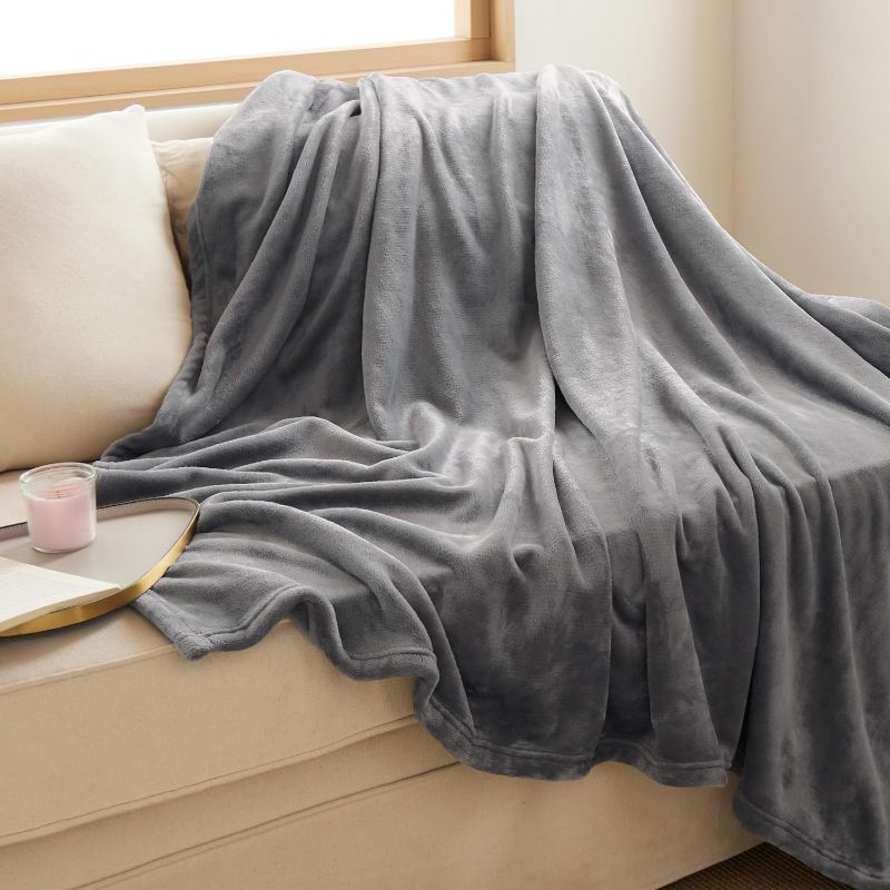 Photo 1 of **UNBRANDED GREY THROW BLANKET