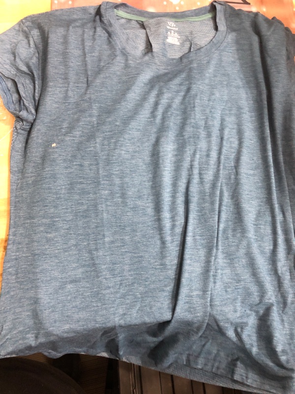 Photo 1 of Blue excersize shirt size medium