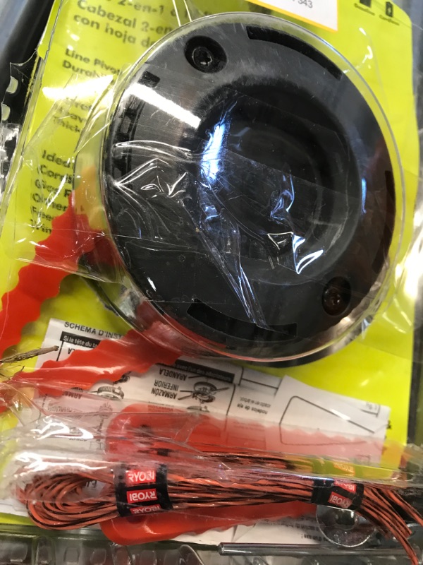 Photo 1 of RYOBI AC053N1FH Reel Easy+ 2-in-1 Pivoting Fixed Line and Bladed Head for Bump Feed Trimmers
