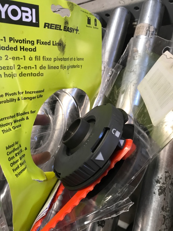 Photo 1 of RYOBI AC053N1FH Reel Easy+ 2-in-1 Pivoting Fixed Line and Bladed Head for Bump Feed Trimmers