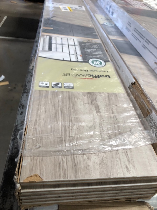 Photo 2 of **CHECK NOTES**Bundle of 3, TrafficMaster
Lakeshore Pecan Stone 7 mm T x 7.6 in. W Laminate Wood Flooring (24.2 sqft/case), 3 cases