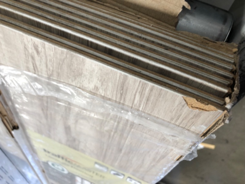 Photo 1 of **CHECK NOTES**Bundle of 3, TrafficMaster
Lakeshore Pecan Stone 7 mm T x 7.6 in. W Laminate Wood Flooring (24.2 sqft/case), 3 cases